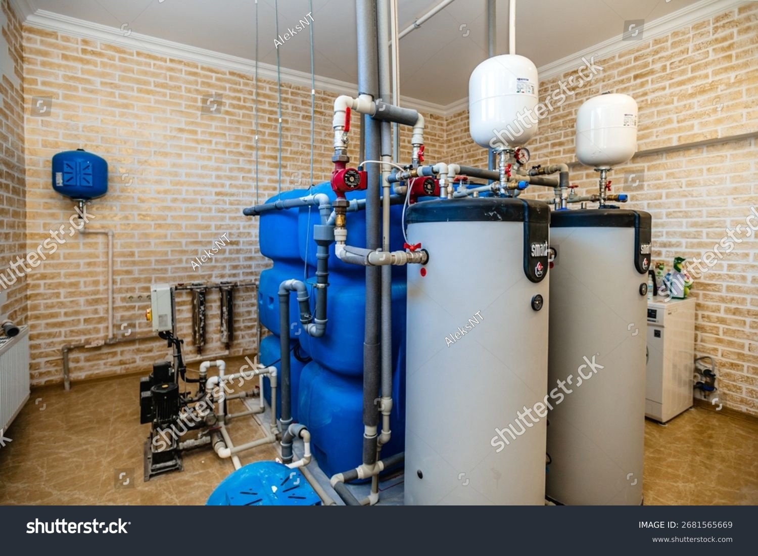 stock-photo-heart-of-house-is-boiler-room-with-two-water-heaters-water-tank-and-gas-boilers-boiler-room-is-2681565669